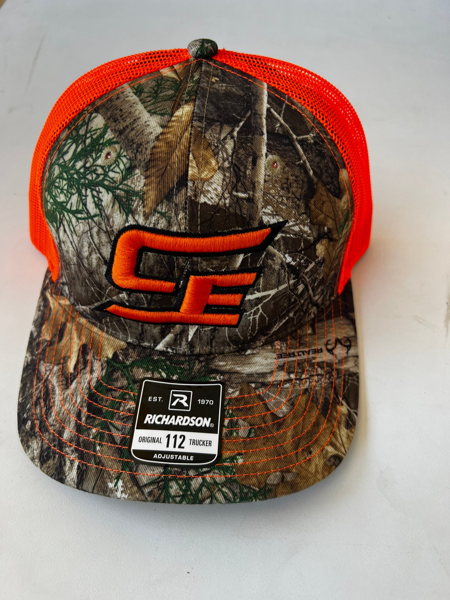 Camo/Safety Orange CE Trucker